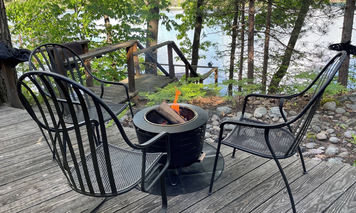 Mancelona Cottage | Beautiful lakefront setting with pontoon boat available to rent.