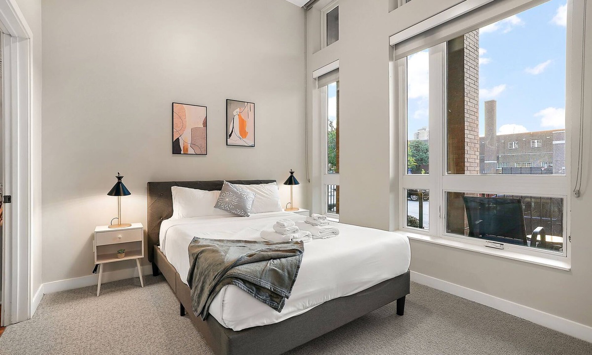 Downtown Minneapolis Apartment | CozySuites in Marquee 2BR 1BA with pool & gym