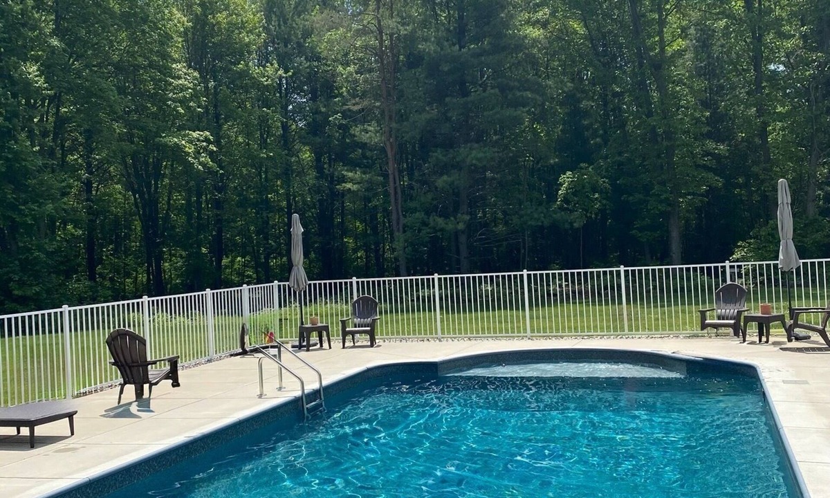 Fruitport House | Custom 4-Bedroom Country Home with Resort-Style Pool & Private Trails
