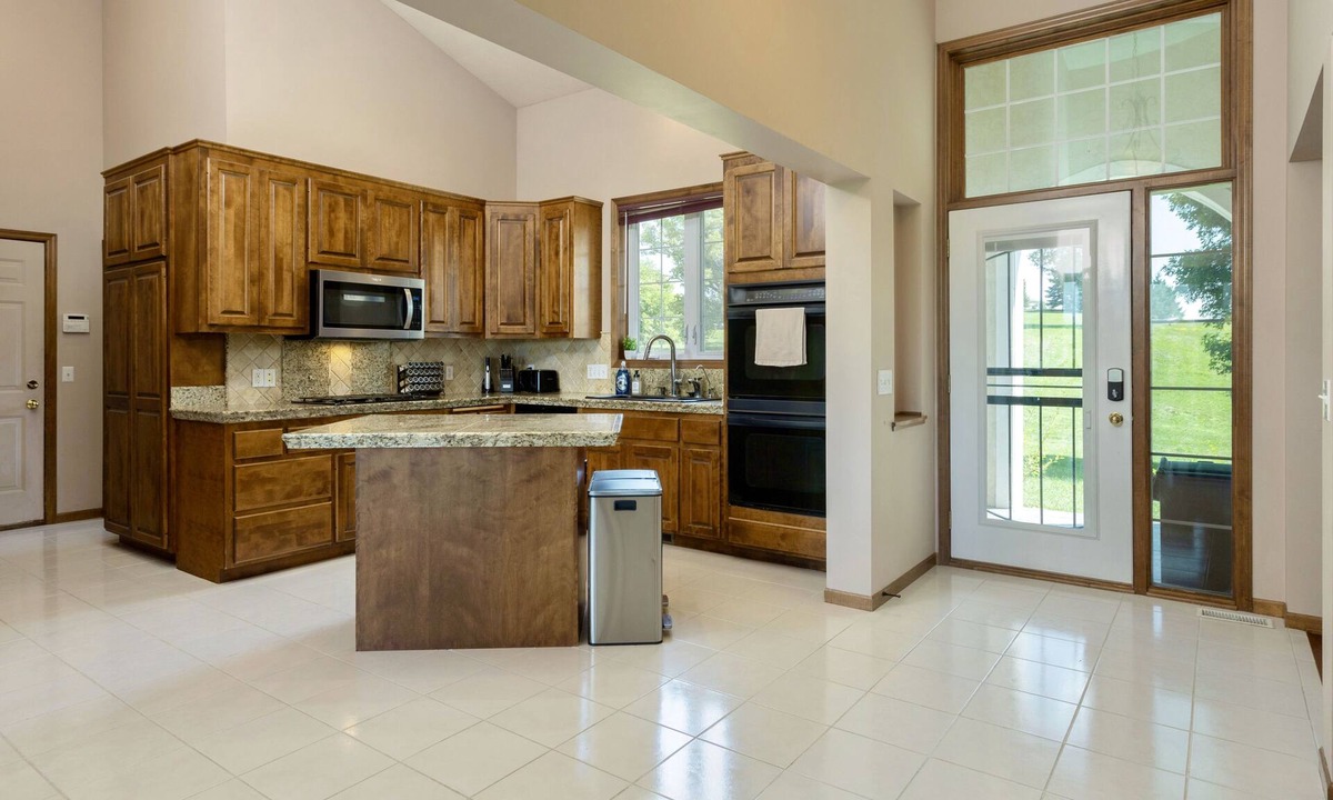 Greenfield House | Indoor Pool Home with Golf Simulator on the Crow River! 22+ Acres!