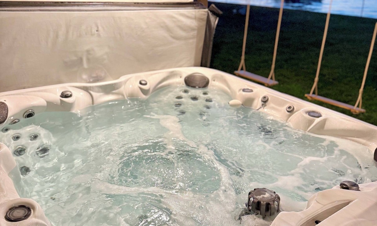 Prudenville House | Lakefront Home: Hot Tub, Paddle Boards, Game Room