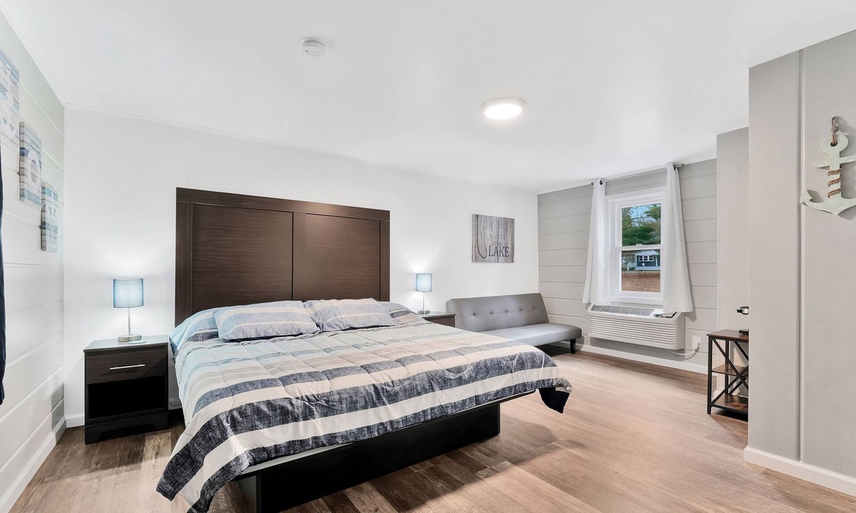 Houghton Lake Hotel | Room #9: Updated King Suite w/small couch