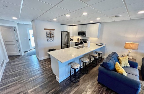 Gypsum Condo | 1 of 4 Waterfront Condo-Style Suites: Clean, Safe & Small Hotel Sleeps 8-32