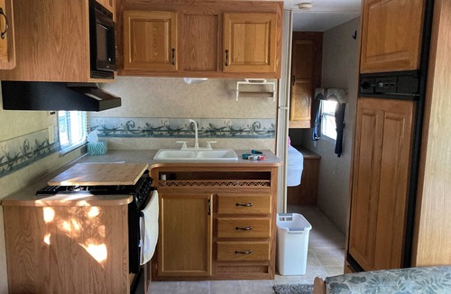Interlochen RV Rental | 29 ft travel trailer on private campground sleeps 7 in Interlochen