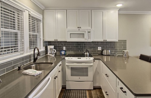 Boyne City Condo | 312 Water Street | Lake Charlevoix Views | Private Beach Access | Fireplace