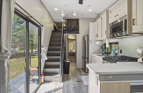 Fountain Cottage | 4 Bedroom Round Lake Getaway: 2 Cabins + 2026 Camper + Dock
