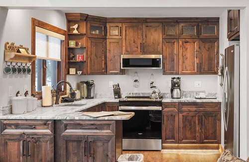 Boyne Falls Condo | 4BR Slopeside | 692 Disciples Village Condo | Fireplace| Ski Cubbies