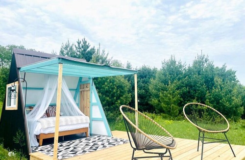 Boyne Falls Cabin | A-Frame Serenity: Tiny Cabin with Panoramic Scenery in Michigan's Tranquil Setting