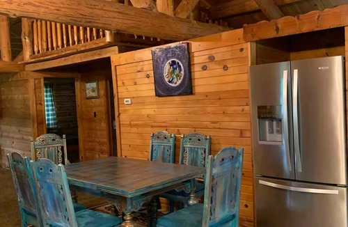 Branch Cabin | Beautiful Log Cabin 11ac. 4 br. 2.5 ba. on snowmobile trails in Manistee forest.