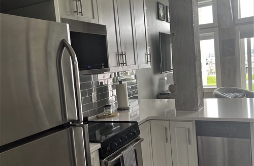 Charlevoix Condo | Casa Lake Life on Beautiful Lake Charlevoix in Foster Boat Works