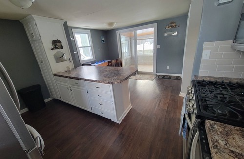 Alto House | Charming 2-bedroom house with AC, WiFi within walking distance of Campau Lake.