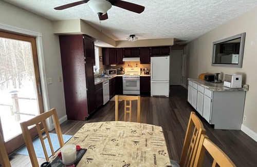East Jordan House | Cozy 4br 3 bath home with acreage and a creek just minutes from Boyne Mountain