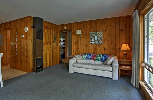 Burt Lake House | Cozy Alanson Cabin - steps to dock on Lake Burt!