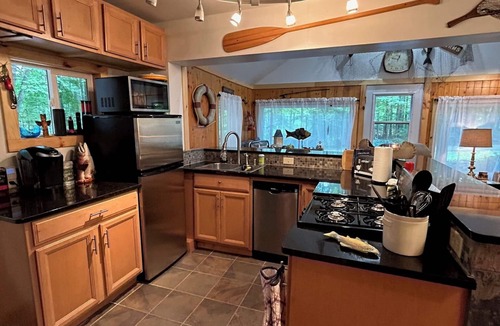 Elcho Cabin | Cozy cabin just steps away from Upper Post Lake. Pet friendly with a small fee!