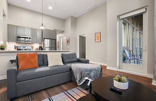 Downtown Minneapolis Apartment | CozySuites in Marquee 2BR 1BA with pool & gym