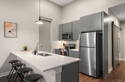 Downtown Minneapolis Apartment | CozySuites in Marquee 2BR 1BA with pool & gym