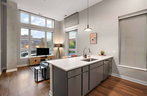Downtown Minneapolis Apartment | CozySuites in Marquee 2BR 1BA with pool & gym