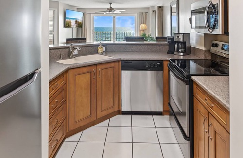 Seawinds Condo Condo | Direct oceanfront corner 2/2 with stunning views, huge balcony, heated pool, and garage parking