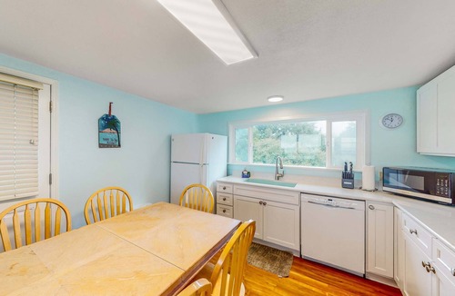Nelscott House | Dog friendly home with deck and ocean views close to the beach