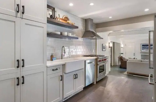 Saugatuck House | Dogwood Creek-Cozy in-town cottage with incredible deck, gardens, pool, sauna
