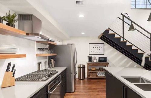 Grand Rapids Apartment | Drumlin Suite - Downtown Luxe Historic Roots & Private Parking