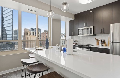 Rush and Division Apartment | Elegant 2BR with Resort Amenities & City Views
