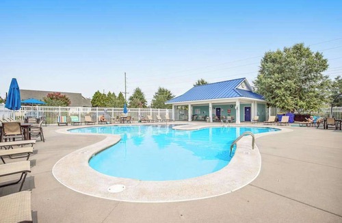 Millville House | Elegant home in Millville by the Sea with 2 pools, gym, dock & W/D