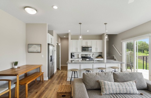 West Des Moines House | Exclusive Scenic Escape End Unit New Construction Jordan Creek w/2 Car Garage