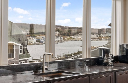 Bay Harbor Condo | Experience luxury at The Pinnacle 510 in Bay Harbor, featuring 2 King beds and stunning lake views.
