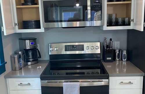 Charlevoix Condo | Full Kitchen & Laundry in Large Condo- Very Clean!