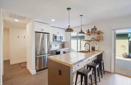 Gresham House | Gresham Modern Industrial Stay with hot tub