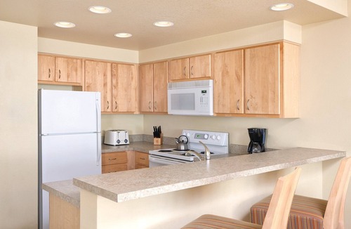 Seaside Gilbert District Resort | Heated outdoor swimming pool and hot tub!