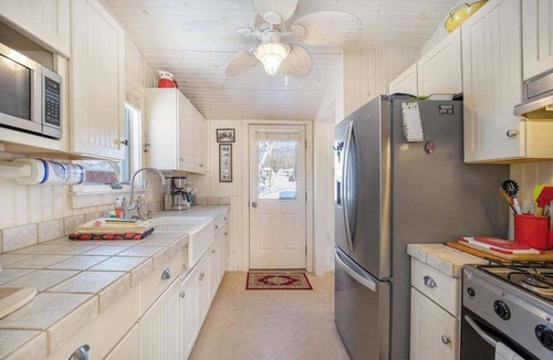 Walloon Lake House | Historic cozy cottage in Walloon Lake village close to Boyne Mountain skiing!