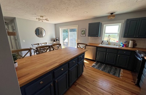 Suttons Bay House | Home north of Suttons Bay. Game room, arcade games, Grill, Fire pit. Dog ok