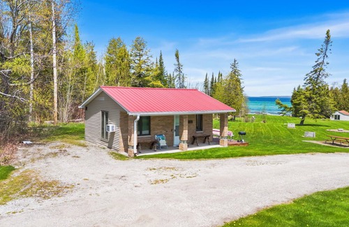 Cheboygan House | Lake Huron Cabin | Mackinac Views, Shared Beach & Fire Pit