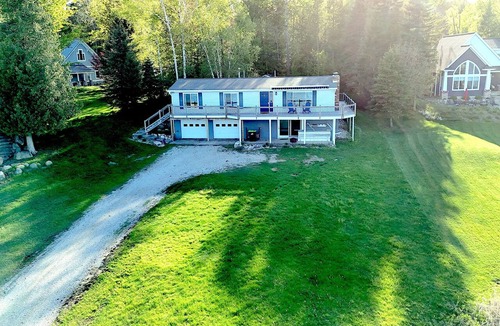 East Jordan House | Lakeside Bliss: Your Ultimate Four-Season Retreat