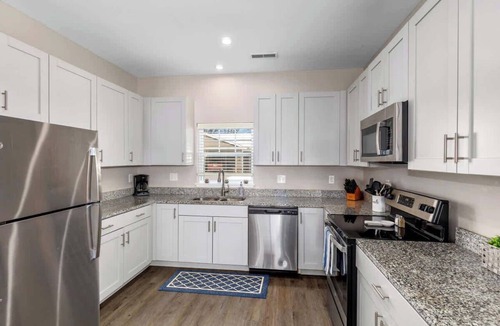 Grandville Condo | Modern 2BR & 2BA New Build Condo w Garage & Patio