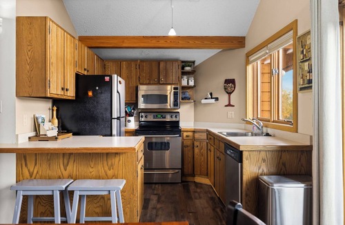 Mancelona Ski Chalet | On 18th green @ shanty creeks Schuss Mtn - Sleeps 8