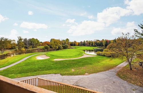 Mancelona Ski Chalet | On 18th green @ shanty creeks Schuss Mtn - Sleeps 8