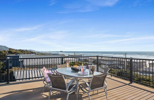 Rockaway Beach House | Panoramic ocean, lake, and mountain views surround this spacious 4-bedroom retreat. Enjoy a rooftop deck, game room, and easy beach access just steps from the sand.