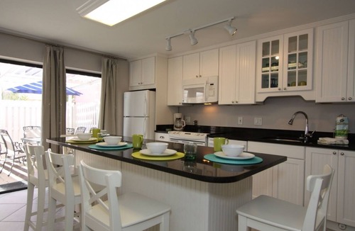 St. Pete Beach Condo | Patio Area - Walk to Beaches Shops & Restaurants