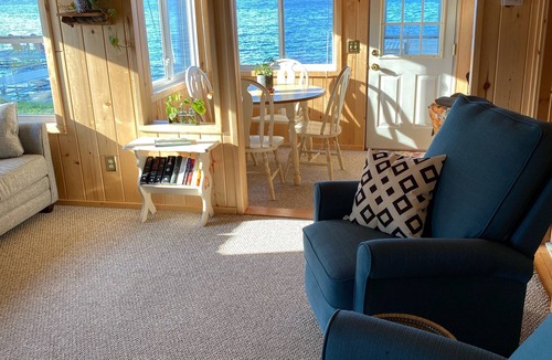 Carp Lake Cottage | Quaint Cottage with a Private Dock on Paradise Lake