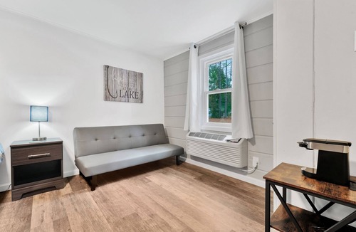 Houghton Lake Hotel | Room #9: Updated King Suite w/small couch