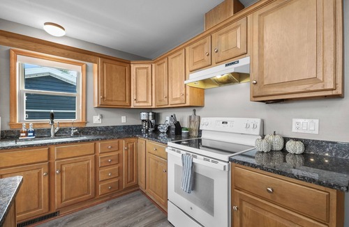 Houghton Lake Cottage | Sauna, Game Room, and Houghton Lake Beach Front