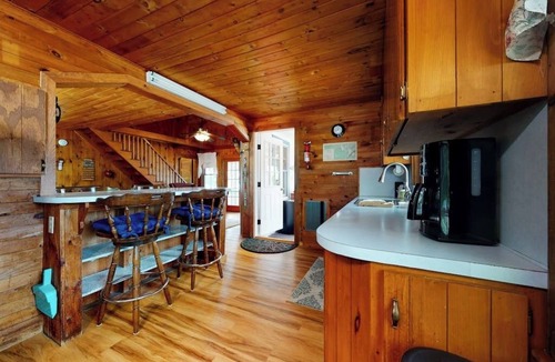 The Bays Cottage | Secluded bayfront cottage with private beach, grill, & bay views