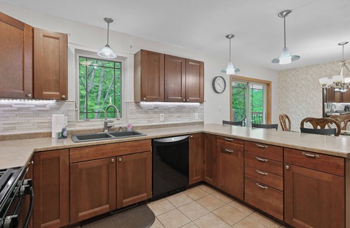 Mosinee Apartment | Stylish 2-Bedroom Upper-Townside Getaway I Firepit I Deck I Yard