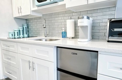 Brigantine Condo | Stylish condo steps from the beach! Elegant blend of comfort and convenience.