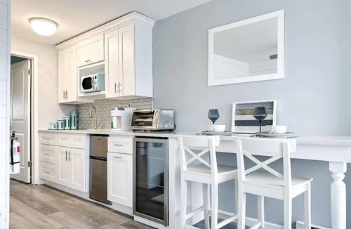 Brigantine Condo | Stylish condo steps from the beach! Elegant blend of comfort and convenience.