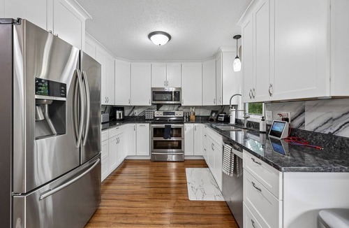 Mounds View House | Sunnyside Stay - 5BR/Theater/Games. Near NSC & TPC