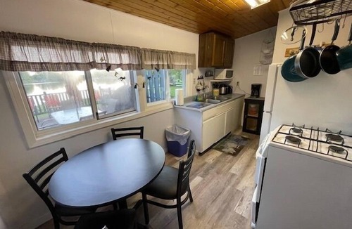 Clare Cottage | Sunset Shores #3-Up North: Classic Summer Fun: Swimming, Fishing, Bonfires